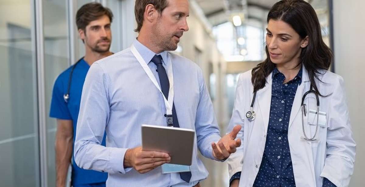 Doctors reviewing notes